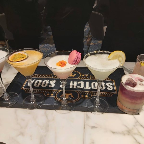 Assorted colorful cocktails on a bar counter