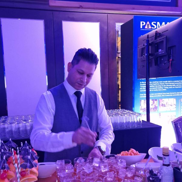 Bartender preparing cocktails at after-party event