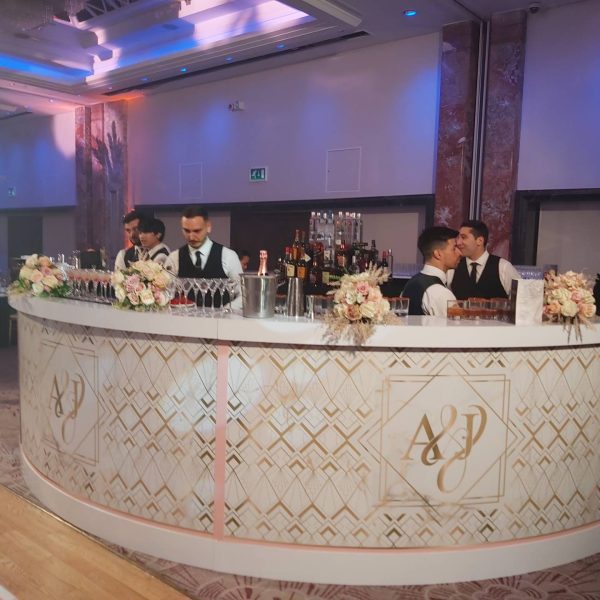 Elegant bar setup at a wedding reception.
